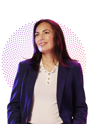 Person in blazer in front of a patterned ombre circle