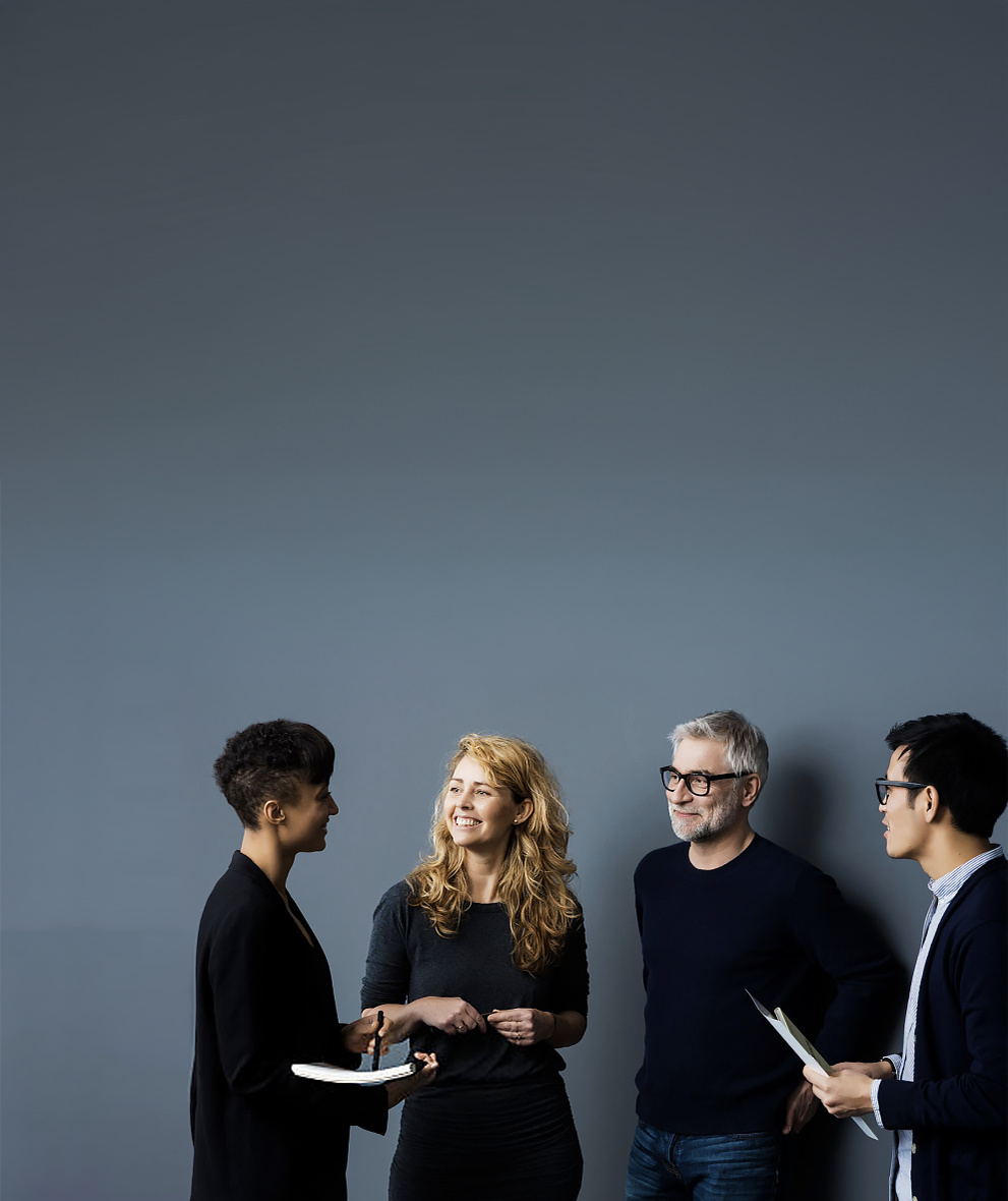 Four professionals discussing