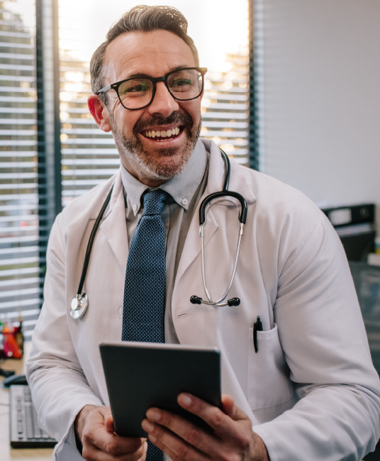 A male doctor smiling