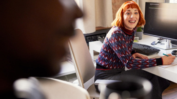 Photo of someone working at a desk