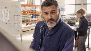 Man with a beard at table