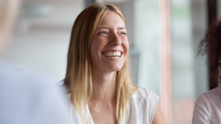 Woman smiling in office setting