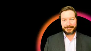 Bryan Krastins in front of glow