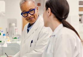 A two females working in a lab