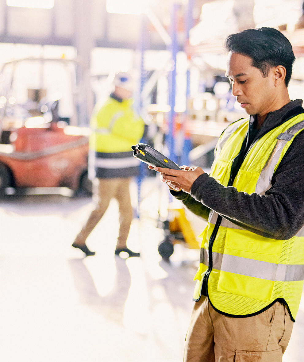 Warehouse worker scanning orders