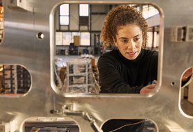 A female working in a warehouse