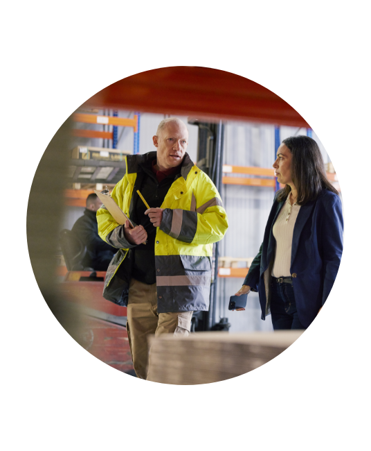 Workers collaborating in a warehouse